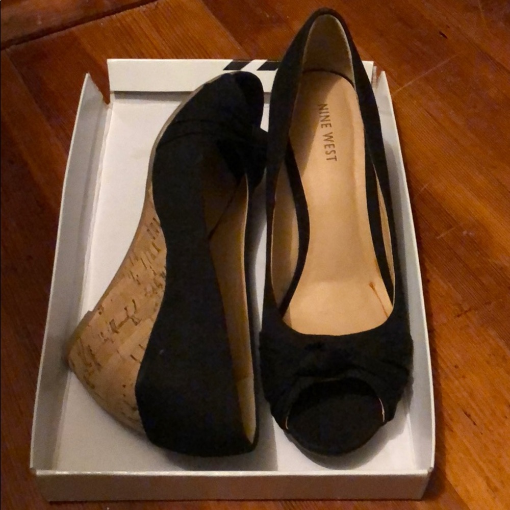 Black cloth wedge peep toe shoe.